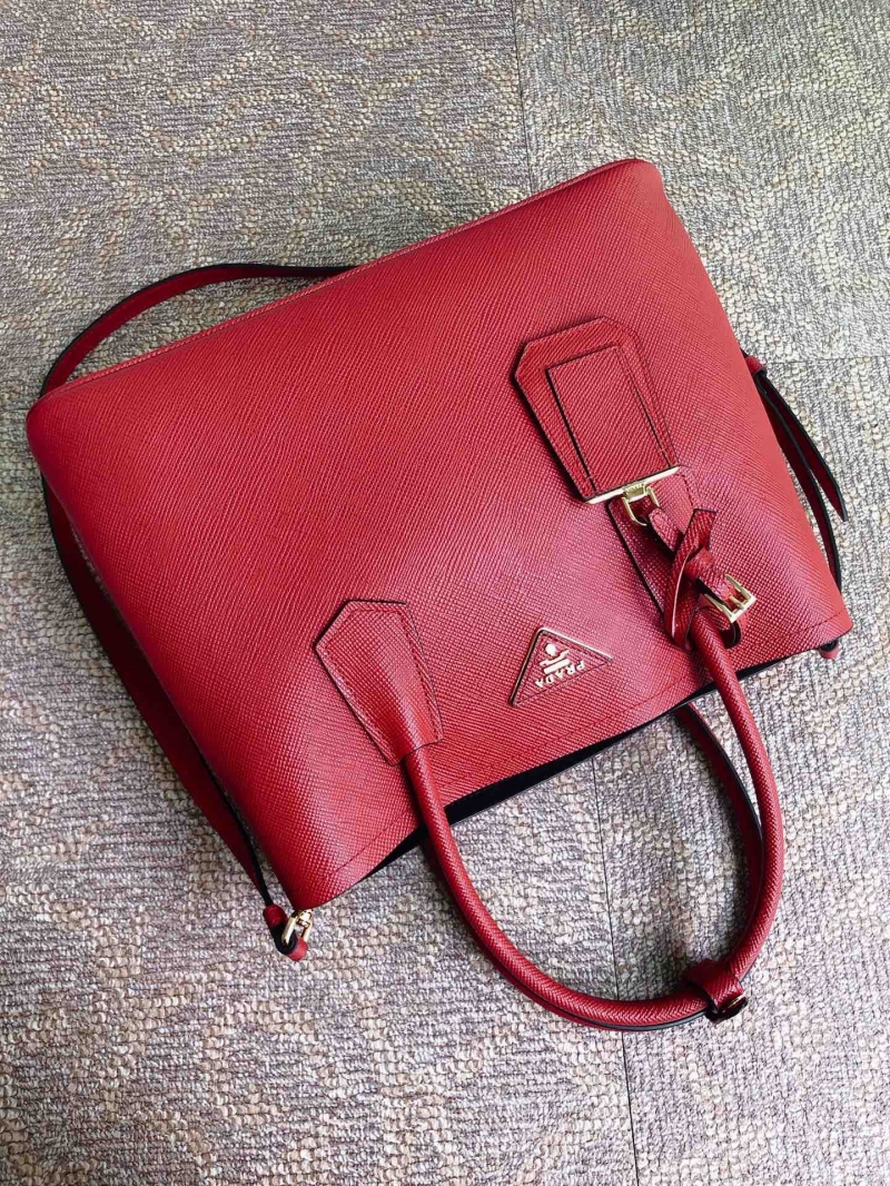 Pra*a top handle bags